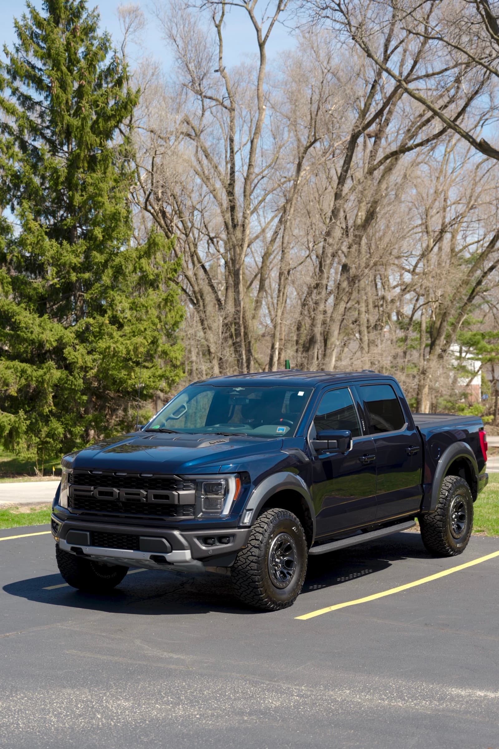 Ford F-150 Raptor parked, front three-quarter view
